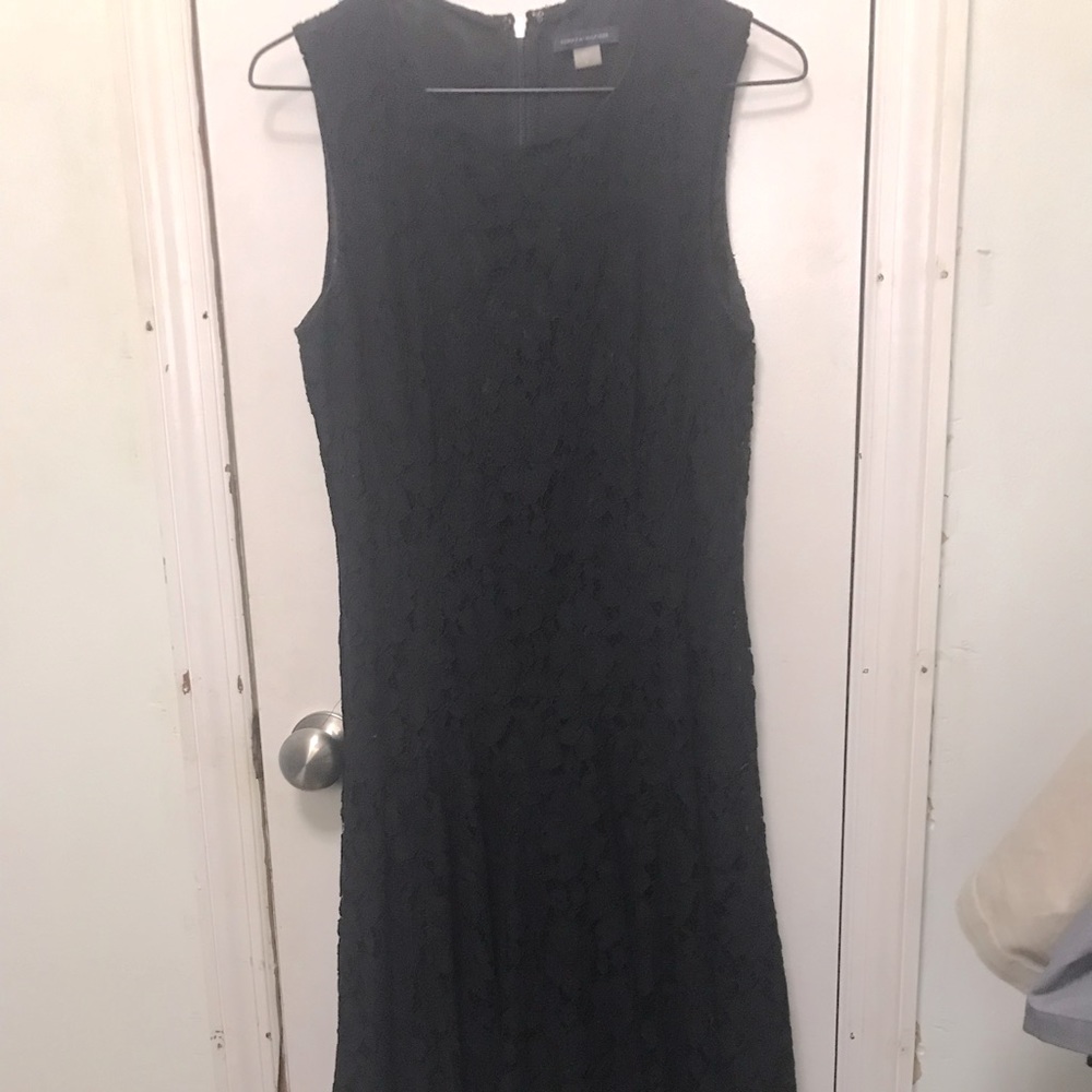 Knee length semi fitted black lace dress